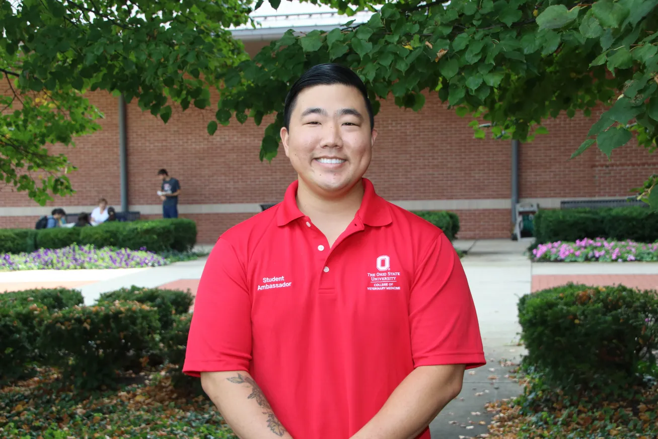 Jeffrey Kim in a red polo