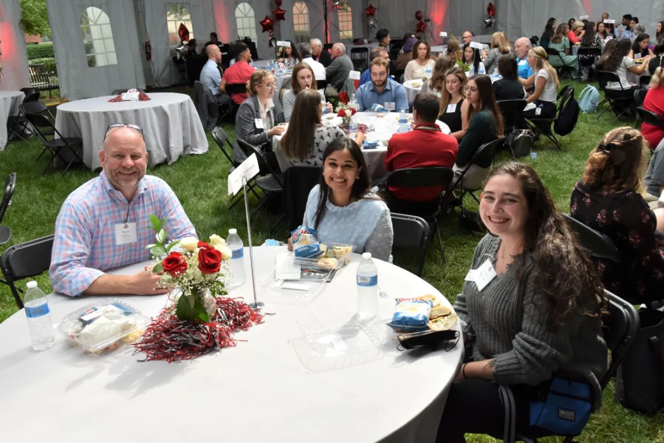 alumni and students at a networking luncheon