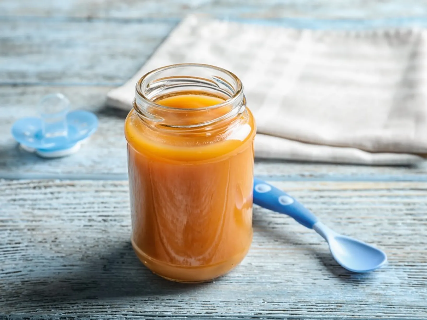 1920_stock-photo-jar-with-healthy-baby-food-on-wooden-table-768833842