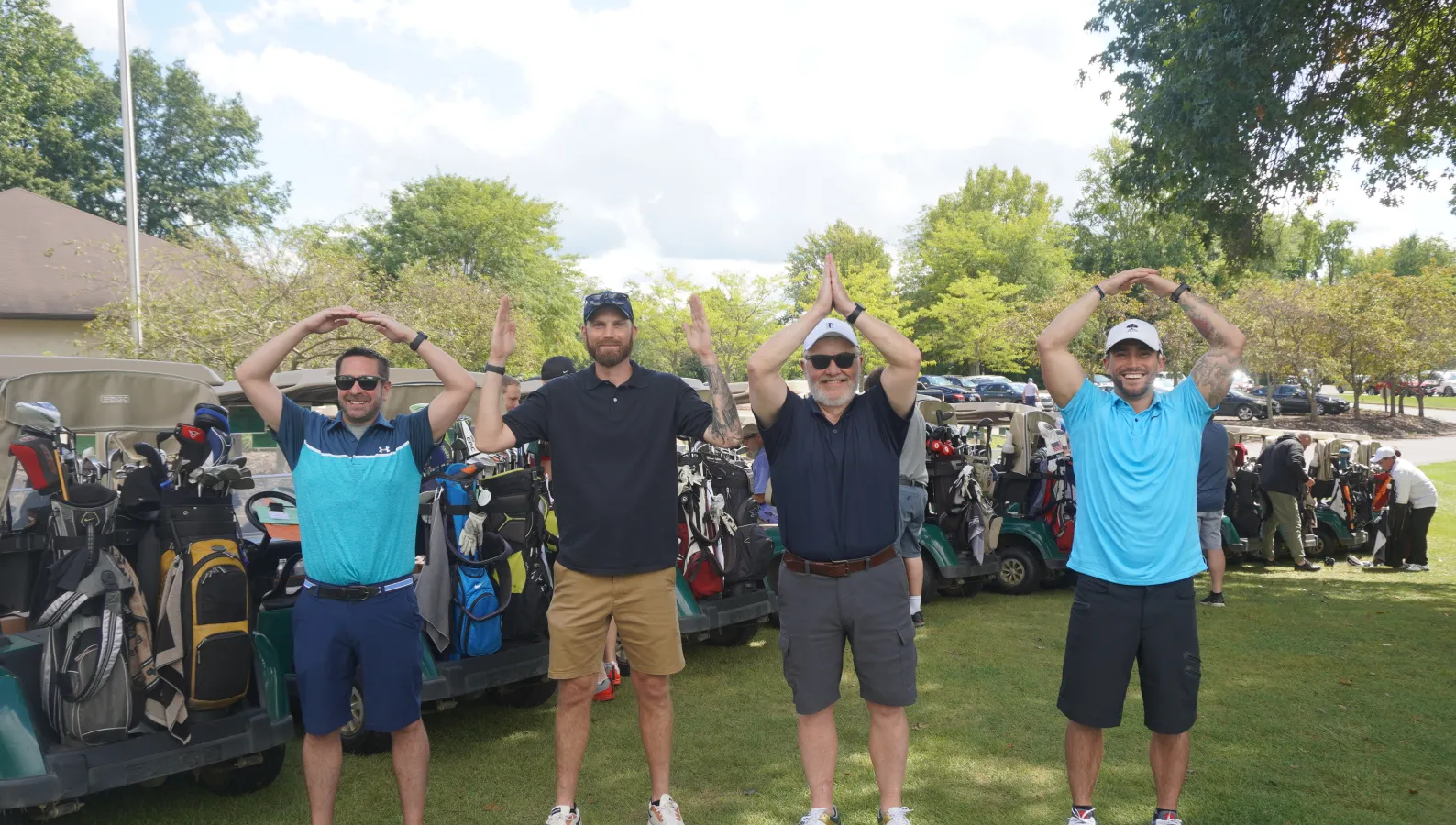 golfers spelling ohio with their arms