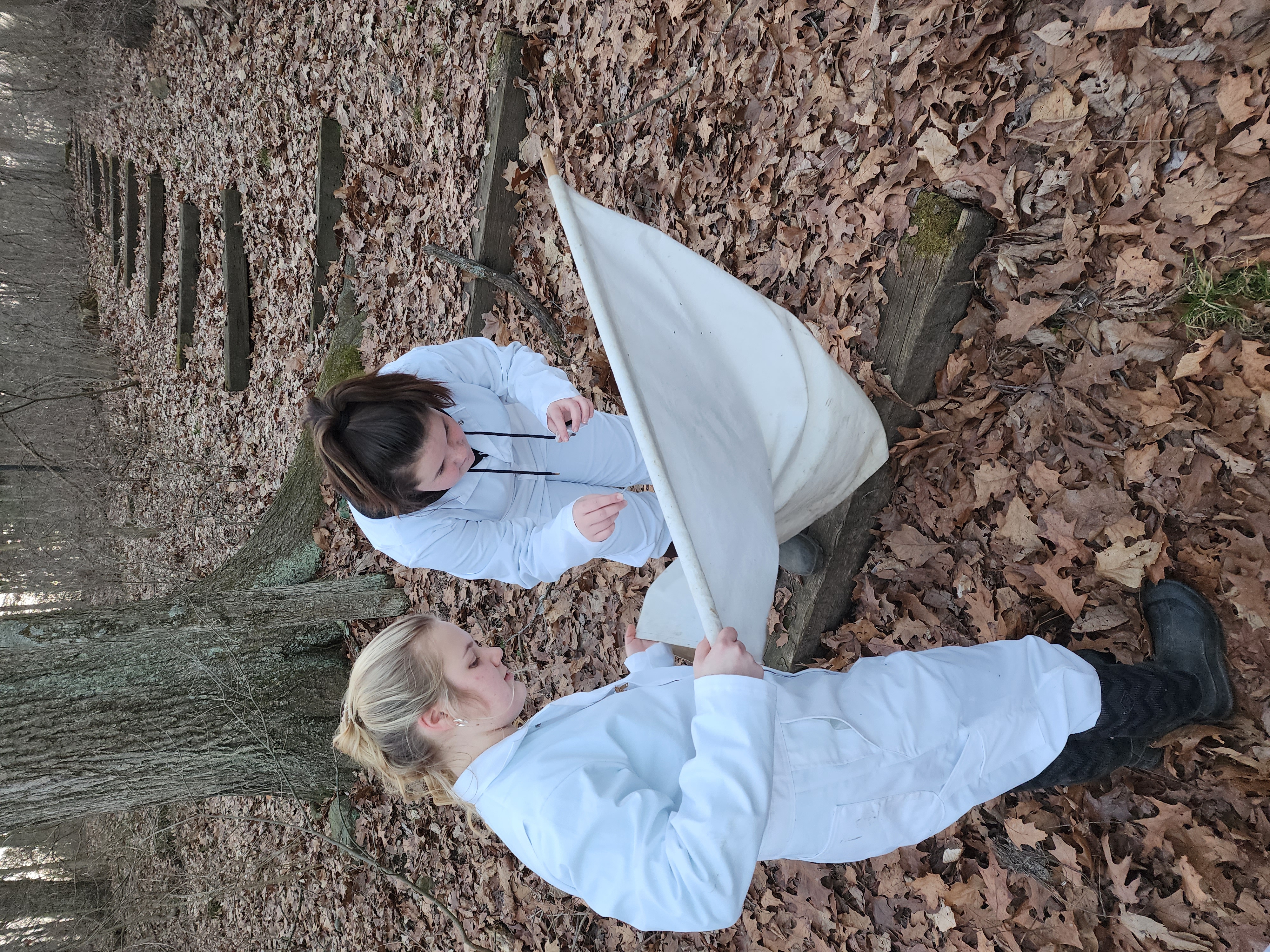 Students from New Philadelphia High School in Tuscarawas County, where tick prevalence is growing, work in the field to collect ticks