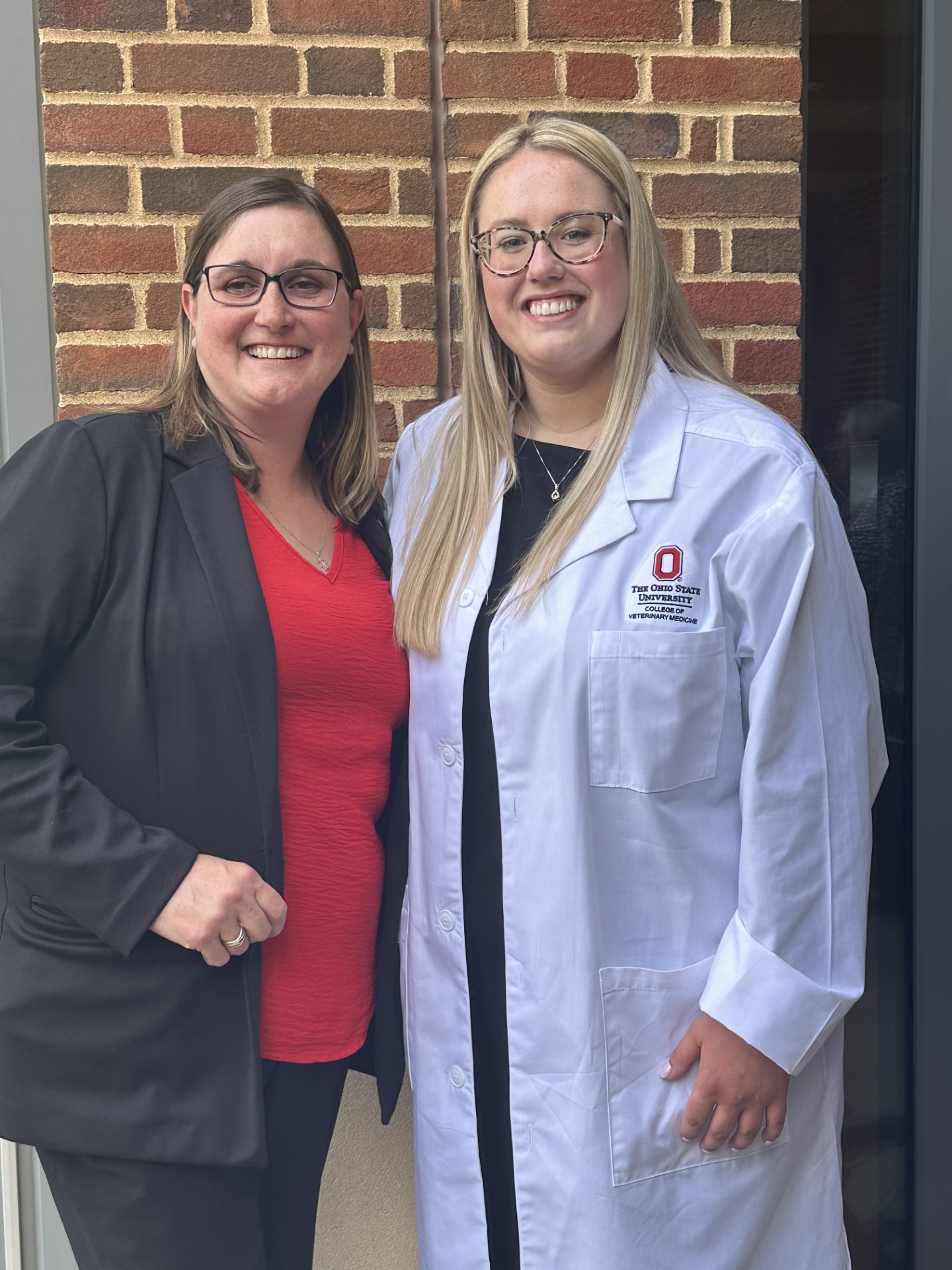 Tasha Small, DVM ’11 (left) at the 2024 White Coat Ceremony with Alexa Bockelman, DVM Candidate, Class of 2025. 