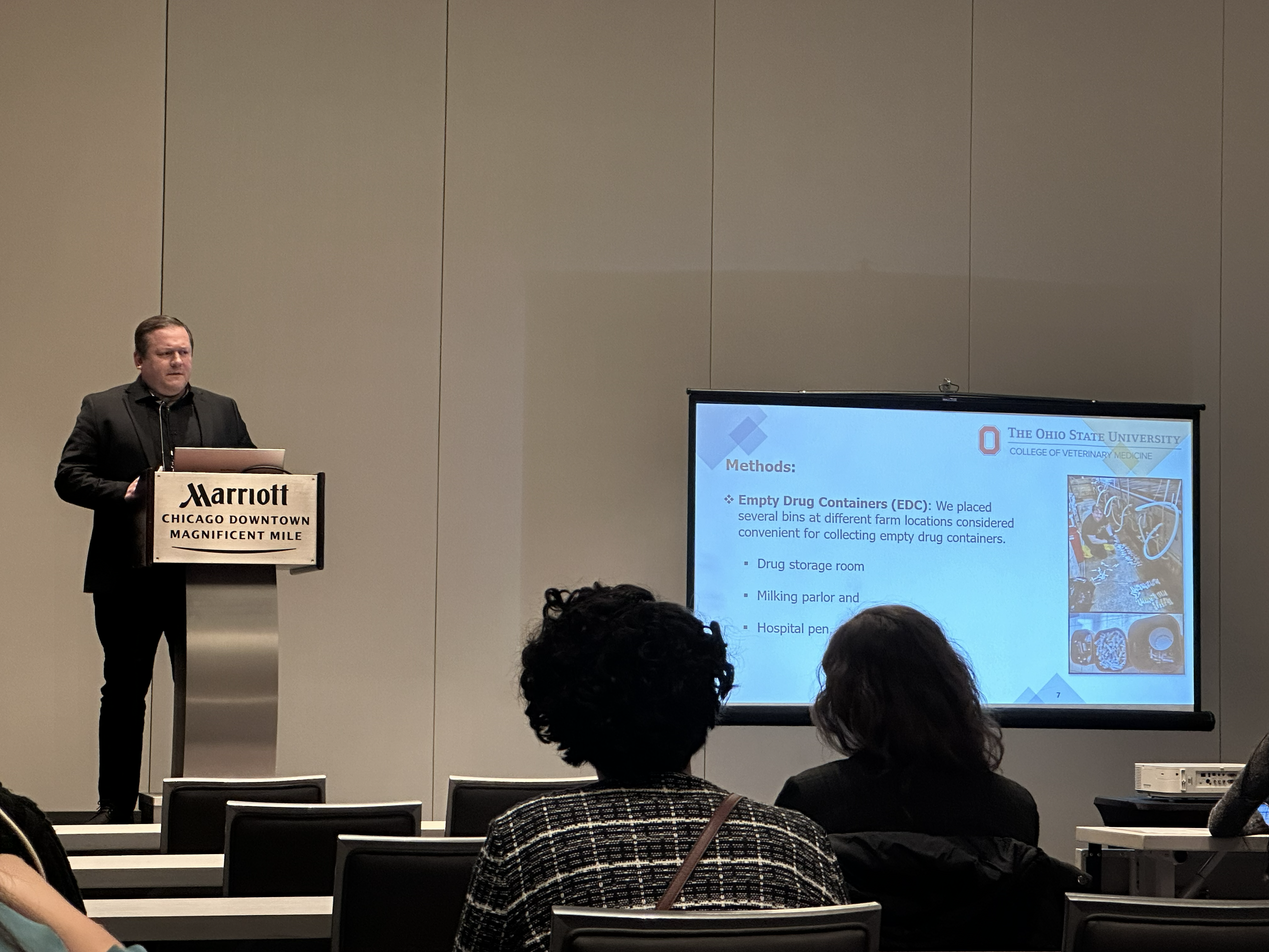 Dr. Rafael Portillo-Gonzalez speaking at a conference 