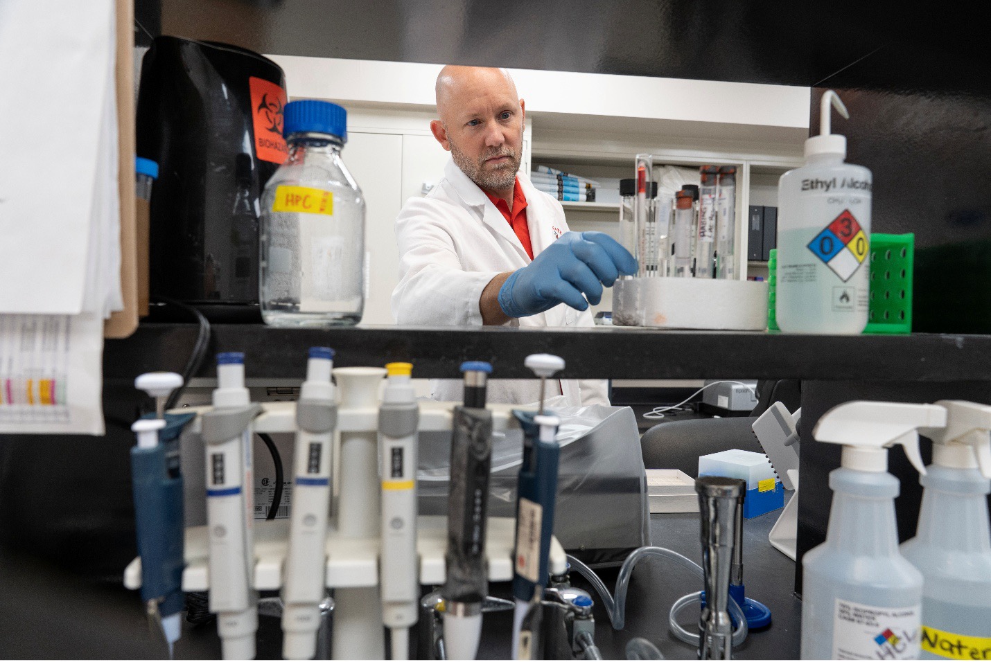 Student in the lab with test tubes