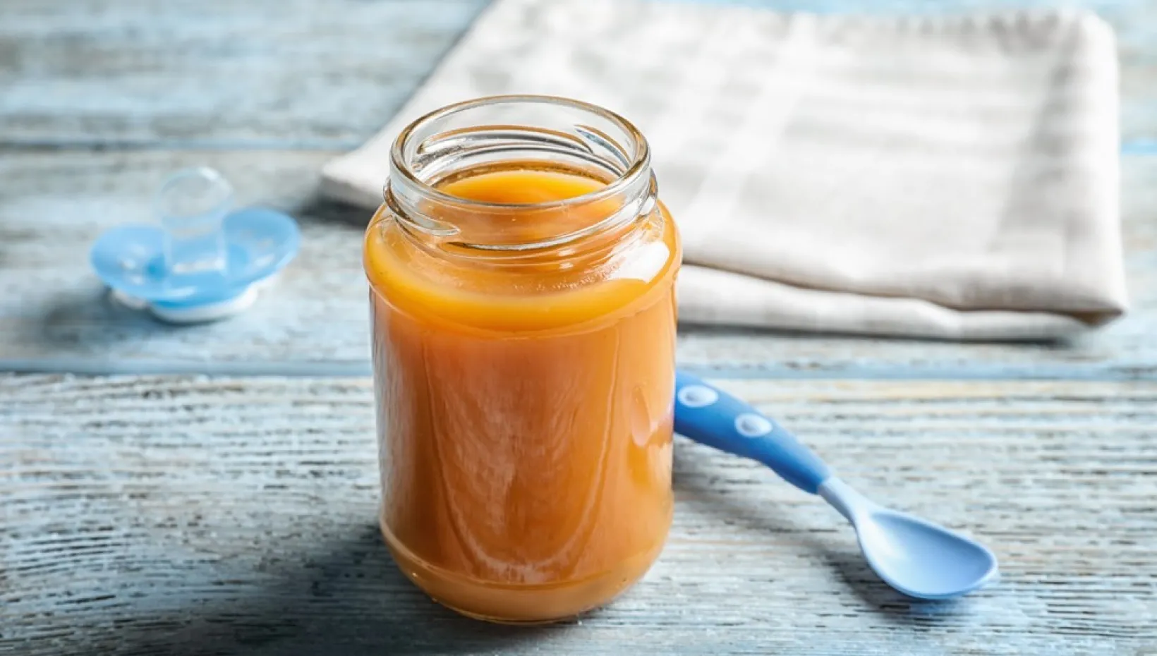 1920_stock-photo-jar-with-healthy-baby-food-on-wooden-table-768833842