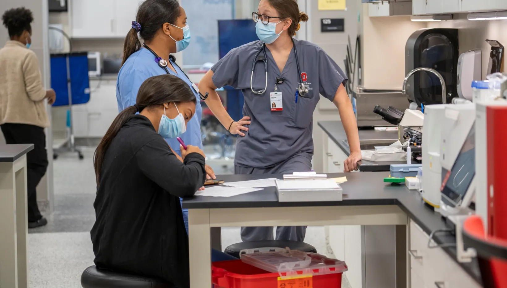 Vet lab technicians working in a lab