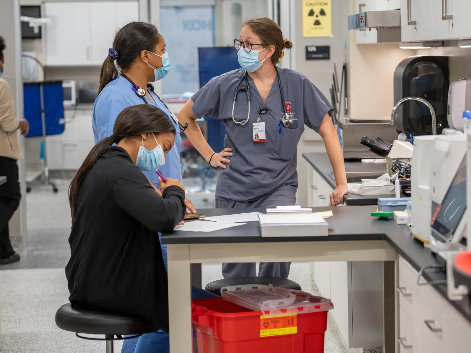 Vet lab technicians working in a lab