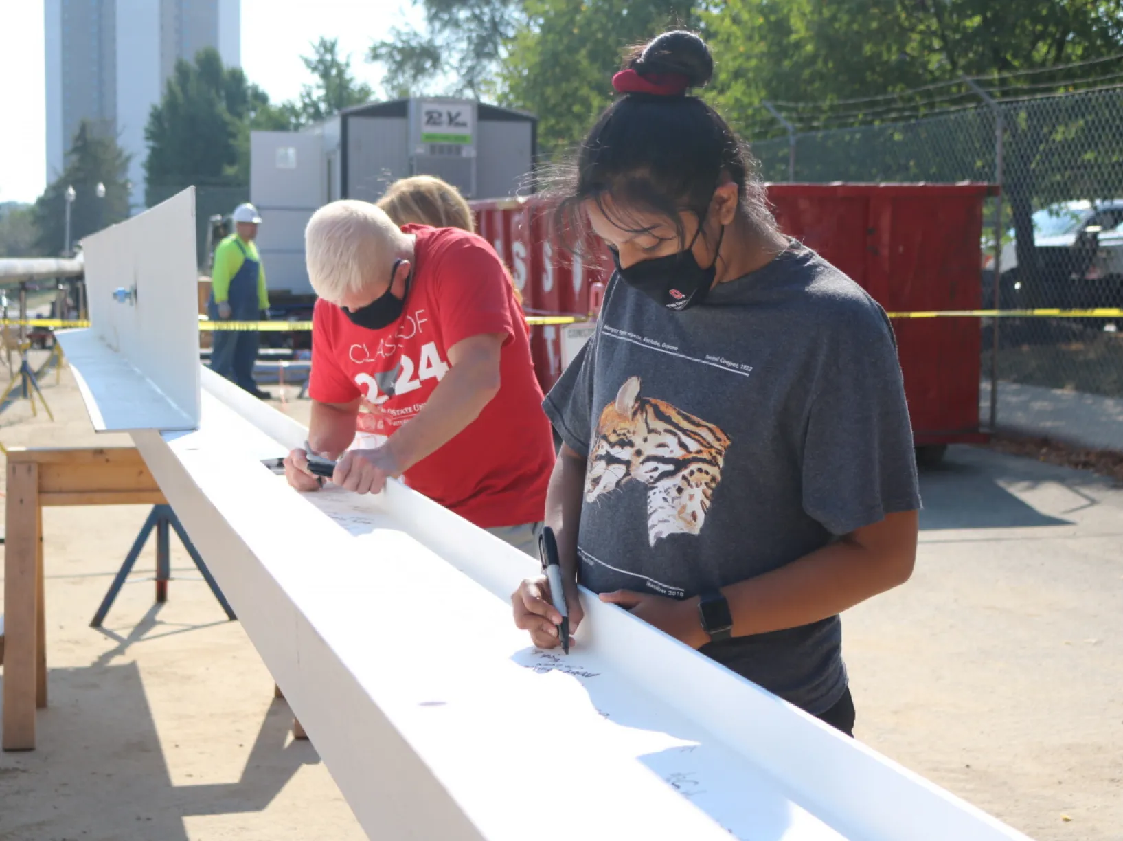 moore signing beam with student 