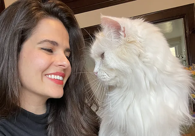 Andy Coravos with her cat Casanova