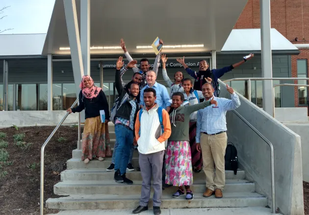 MPH-VPH students on the steps of the veterinary medical center.
