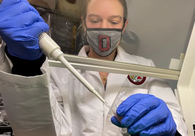 Vanessa Hale with Ohio State mask in research lab 
