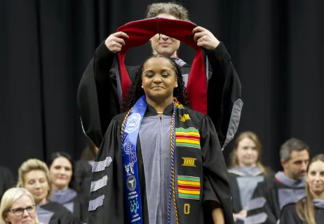 Student at oath and hooding 