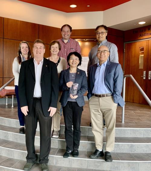 2024 Center for Retrovirus Research Distinguished Research Career Award Winner Peijun Zhang, PhD and college faculty