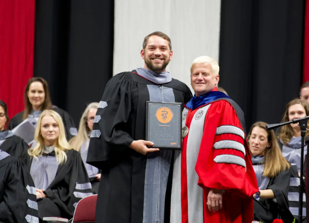 adam rudinsky getting faculty award