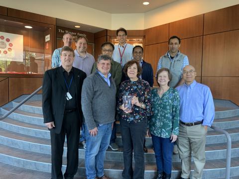 group of people standing for the 2022 Distinguished Research Career Award