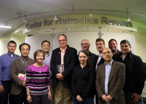 Dr. Stephen Hughes with CRR members. Shown from left are David Symer, Sanggu Kim, Karin Musier-Forsyth, Li Wu, Stephen Hughes, Kristine Yoder, Mamuka Kvaratskhelia, Patrick Green, Shan-Lu Liu, Ross Larue, and  Jesse Kwiek.