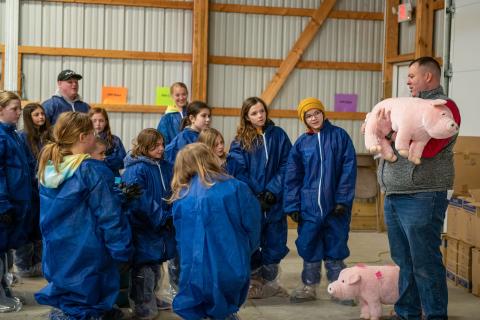 Dr. Andrew Bowman educates Ohio youth in agriculture on reducing the risk of influenza A virus and other zoonotic diseases through The Swientist program.