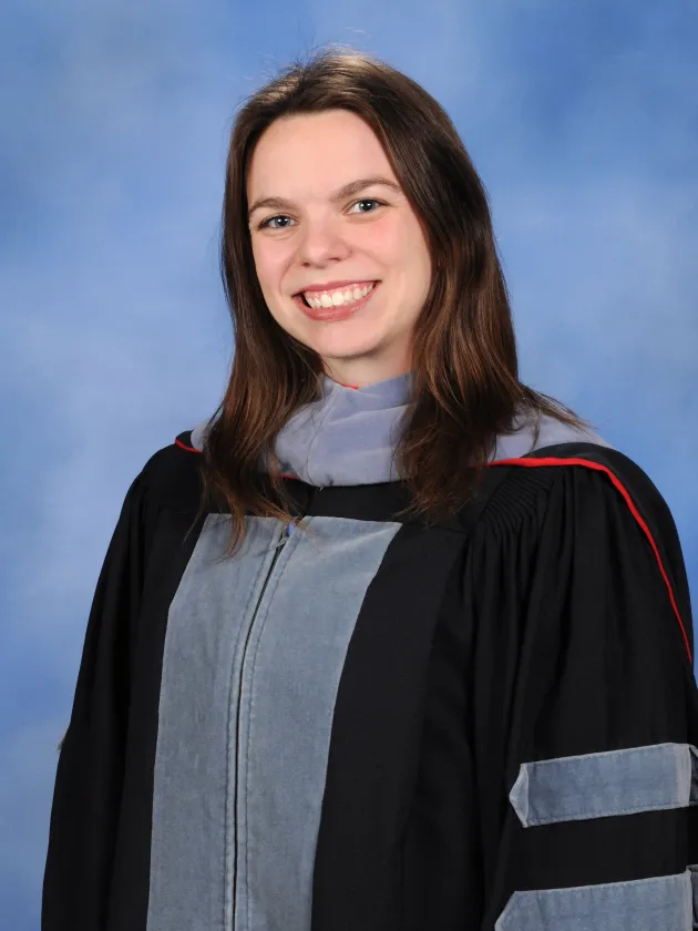 Christine Danish in graduation regalia 